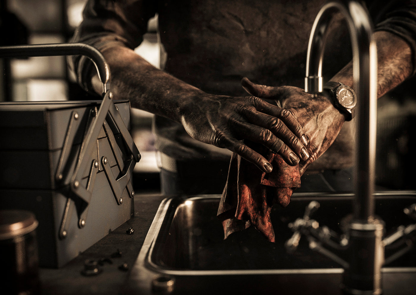 man washing greasy hands